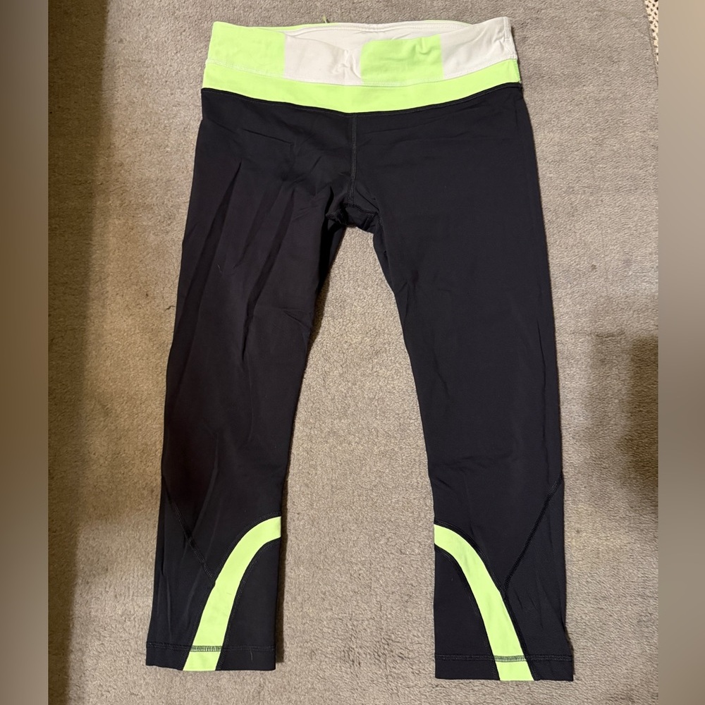 lululemon Crop Leggings Size 8 Black Neon Green Colorblock Zip Pocket